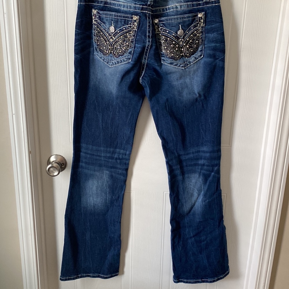 Standard bootcut Miss me dark denim jeans. 31 1/2 inseam.